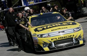 Marcos new image crew pushing car